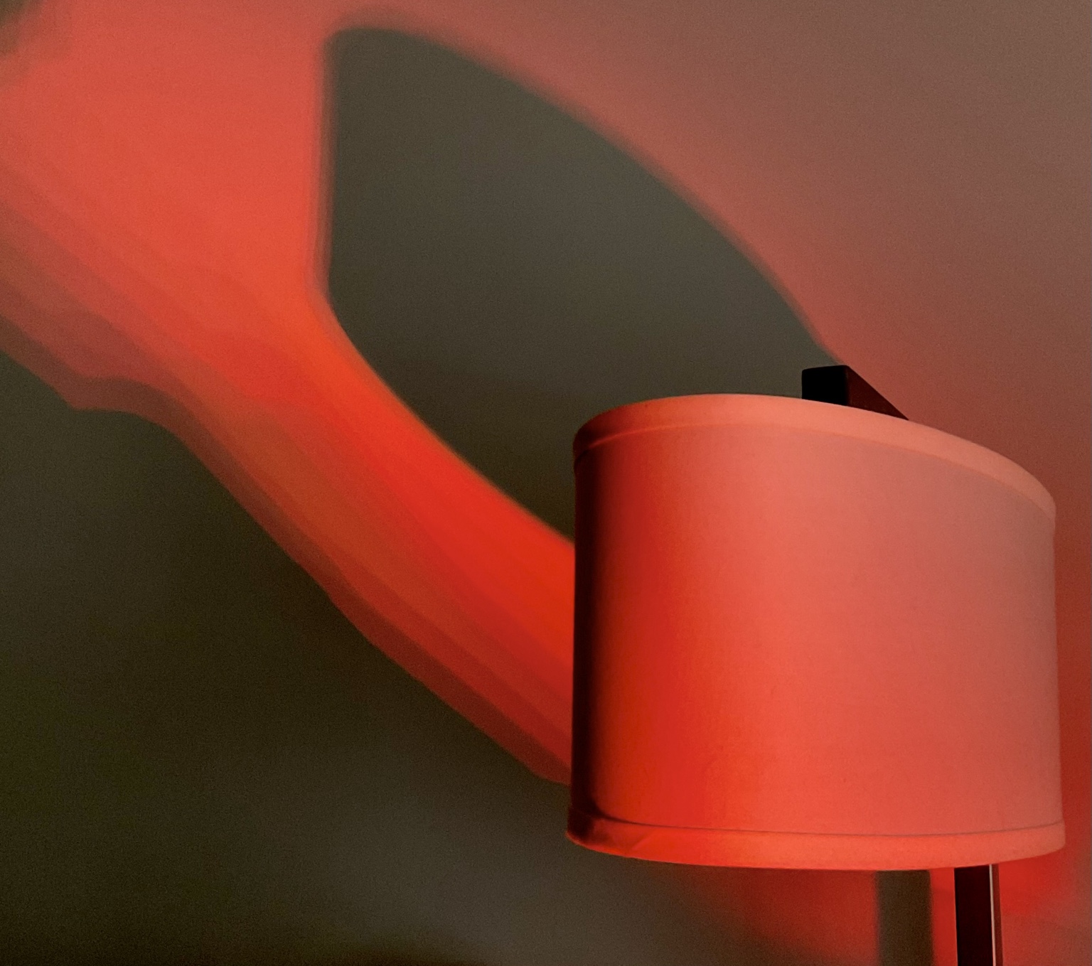 Red lamp and geometric shadow