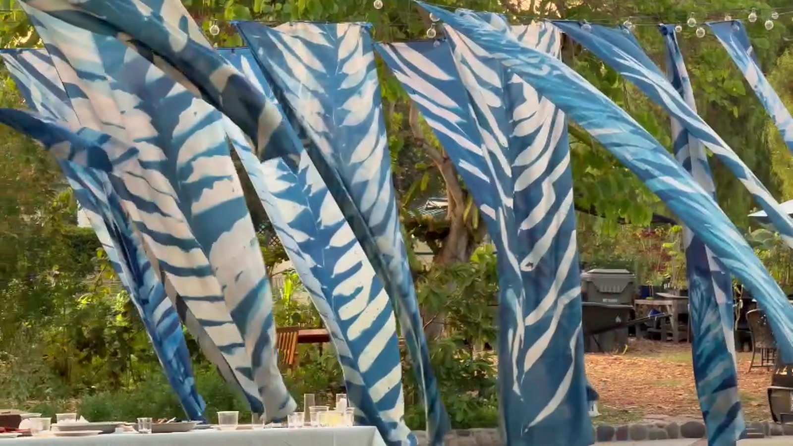 Oriana Poindexter’s cyanotype panels moving like a kelp canopy